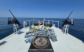 250323-N-NO146-1001 ARABIAN SEA (March 23, 2025) Illegal narcotics seized from a stateless vessel are stacked on the deck of the U.S. Coast Guard Sentinel-class fast response cutter USCGC Emlen Tunnell (WPC 1145) in the Arabian Sea. (Official U.S. Coast Guard photo)