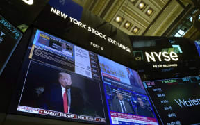 Traders work on the floor of the New York Stock Exchange (NYSE) in the Financial District in New York City on March 4, 2025. (Photo by TIMOTHY A. CLARY / AFP)