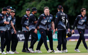 The Black Caps celebrate victory over Ireland in Belfast.
