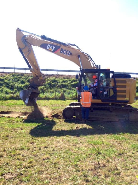 Minister of Transport Simon Bridges turns the first sod at the official opening of the $11 million Normanby Overbridge project in South Taranaki today.