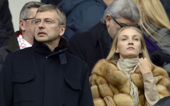 Dmitri Rybolovlev and an unnamed woman watch Monaco Football playing in March.