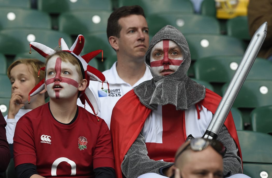 English rugby fans wait for the opening ceremony of the 2015 Rugby World Cup at Twickenham stadium in south west London on September 18, 2015.