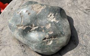 The damaged pounamu touchstone on the cultural compass on Mt Maunganui.