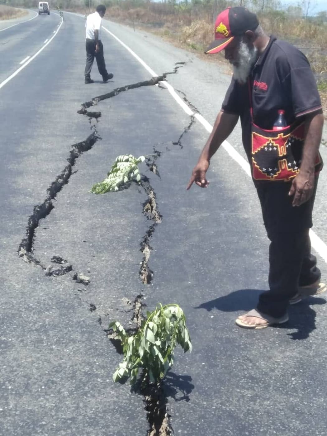 Road cracks near Mutzing along the Markam Valley highway following the 7.6 earthquake