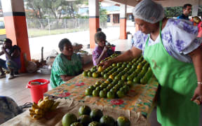 240414. Photo RNZ. Vanuatu. Port Vila, fruit, market, stall, ni-Vanuatu,