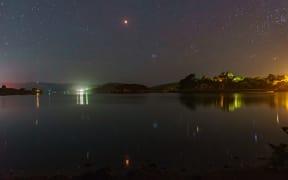 picture of the eclipse over Otago Harbour last night. You can see the blood moon and Matariki, and their reflections.

Looking towards Port Chalmers from Portobello on the Otago Peninsula.