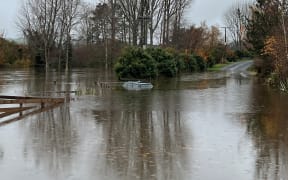 Only the car's roof was visible after the rescue.