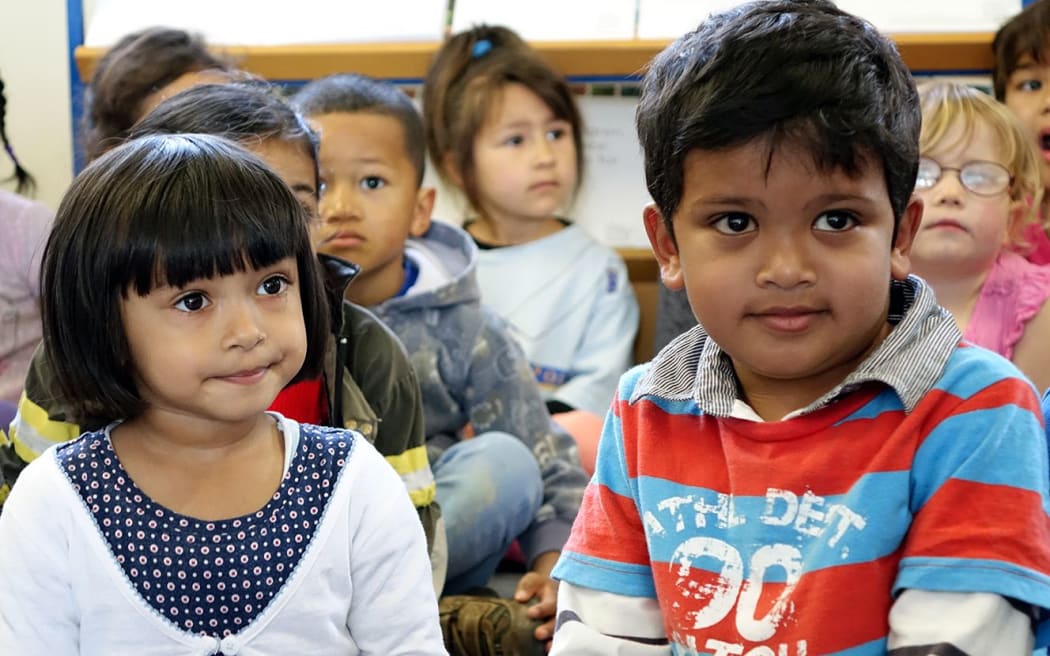 Children at Mt Roskill Kindergarten, where Child Poverty Action Group made the call for cross-party cooperation.