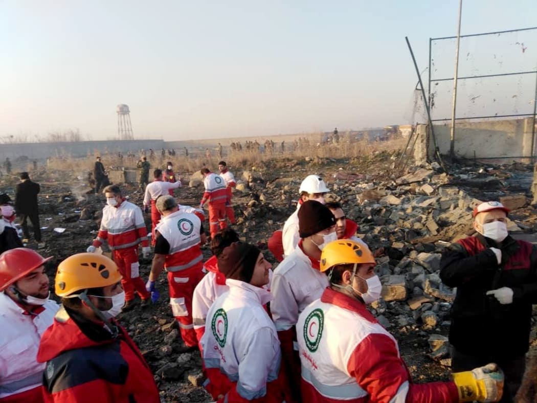 Search and rescue works are conducted at site after a Boeing 737 plane belonging to a Ukrainian airline crashed near Imam Khomeini Airport in Iran on January 08, 2020.