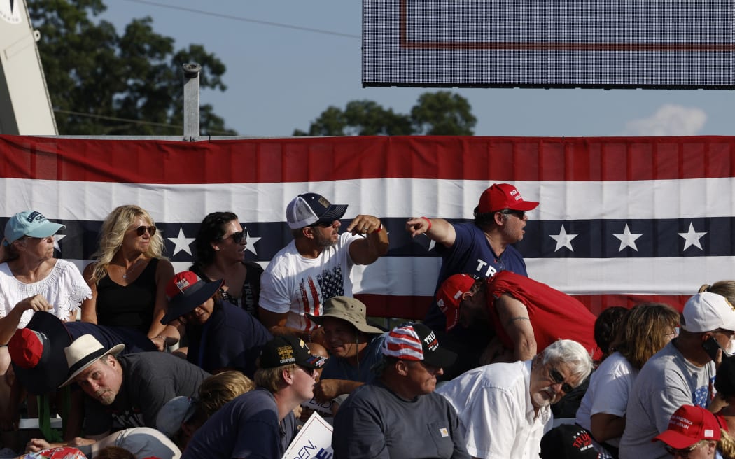 The crowd reacts at former US president Donald Trump's rally on 13 July, 2024, in Butler, Pennsylvania.