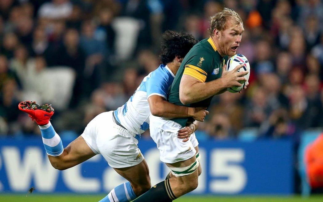 South Africa's Schalk Burger is tackled by Matias Moroni of Argentina ©INPHO/Dan Sheridan