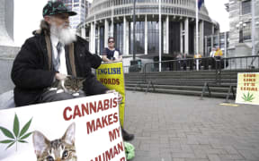 Members of Parliaments, lobists and supports gathered outside Parliament with petition to legalise cannabis, 17,000 people signed the petition. Gary Chiles with his cat Tiffany.