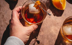 Person having a drink.