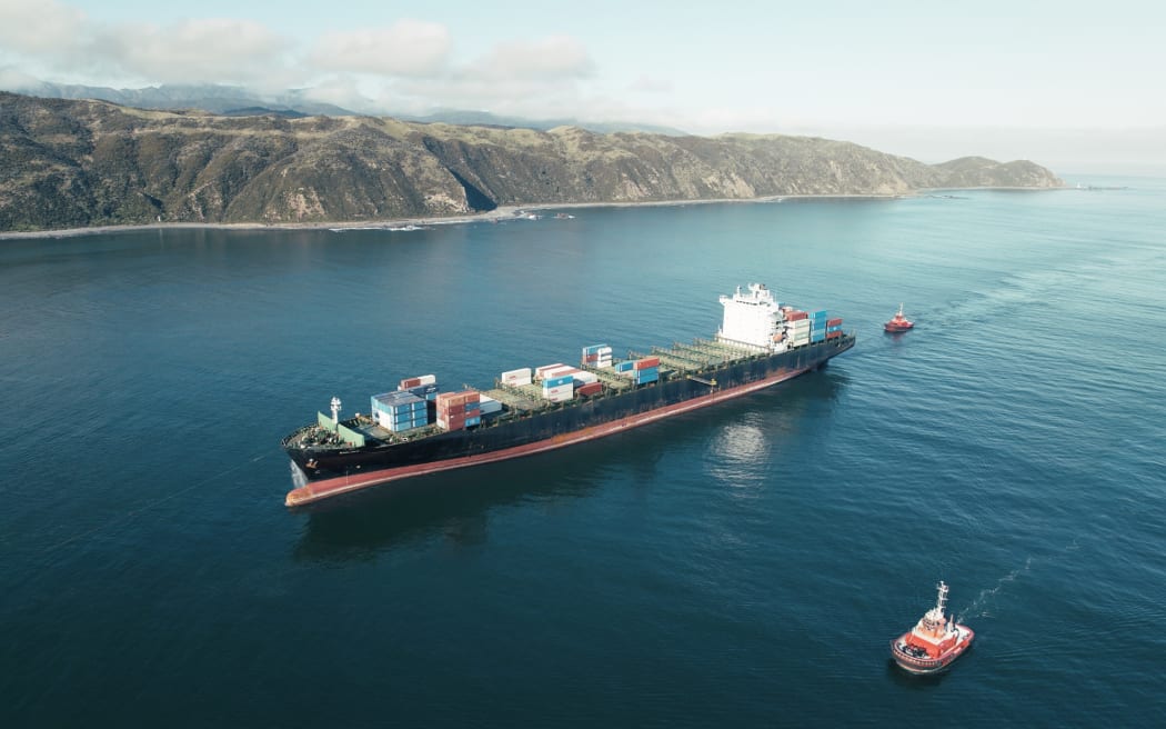 The MV Shiling is towed into Wellington harbour by the tug Skandi Emerald on Wednesday 23 May 2023.