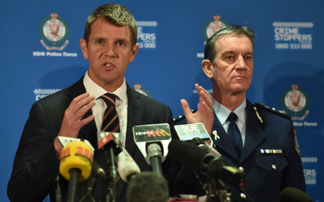 New South Wales Premier Mike Baird, left, alongside New South Wales Police Commissioner Andrew Scipione during a news conference.