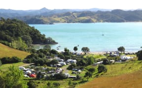 DOC campgrounds around Northland, like this one at Puriri Bay, next to Whangaruru Harbour, are fully booked with holidaymakers planning to see in the New Year at scenic spot.