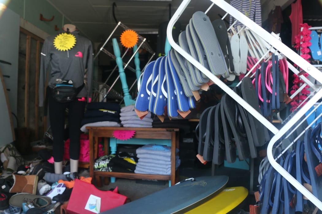 Kaikoura Surf has been shut since the 14 November earthquake. Business owner is Wayne Shanks. His wife Lisa Moffat's shop was next door. The whole building was yellow-stickered so both lost business.