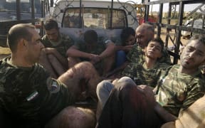Captured Syrian rebel fighters in 2012. Amnesty International alleges that up to 13,000 Syrians, most of them civilians, were executed by the Syrian government between 2011 and 2015.