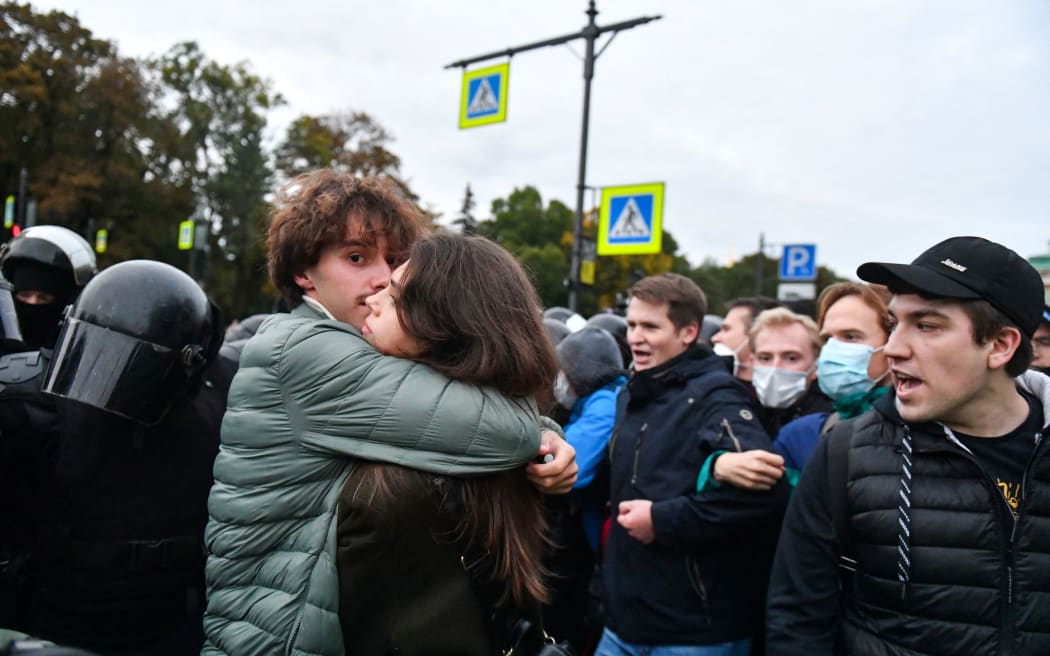 Police officers detain demonstrators in Saint Petersburg on 21 September, 2022, following calls to protest against partial mobilisation announced by President Vladimir Putin.