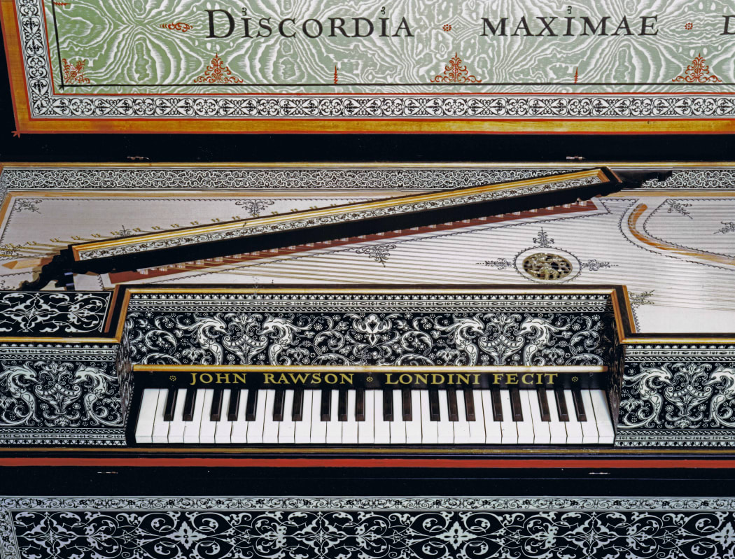 A virginals made by John Rawson. The decoration is done with hand-printed papers.