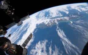 The International Space Station orbits above New Zealand