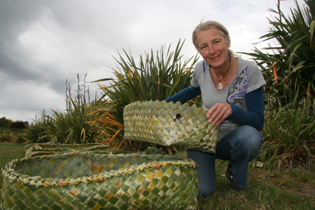 Katarina Tawiri with wahakura flax bassinets