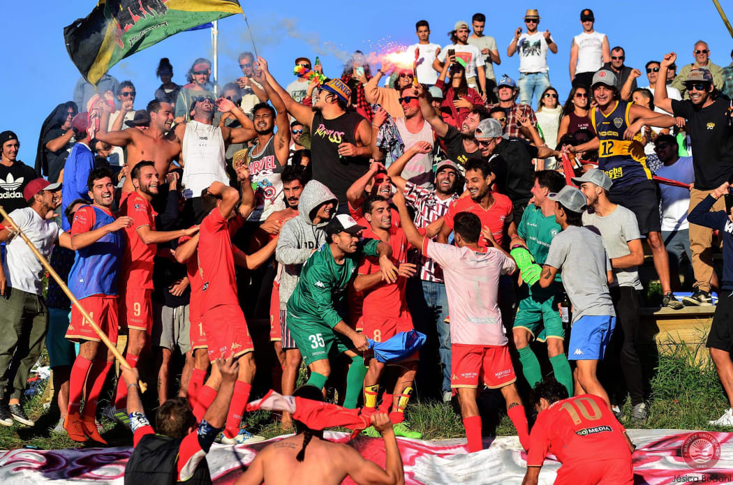 Fans throng players from Waiheke United
