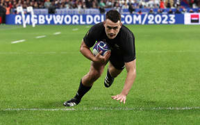 Will Jordan scores the first try in the 2023 Rugby World Cup semi-final match between Argentina and New Zealand at the Stade de France.