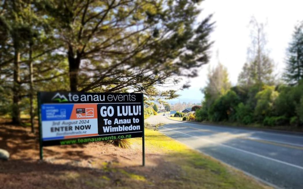 A sign on the way into Te Anau, saying 'Go Lulu Te Anau to Wimbledon', cheering on Lulu Sun.