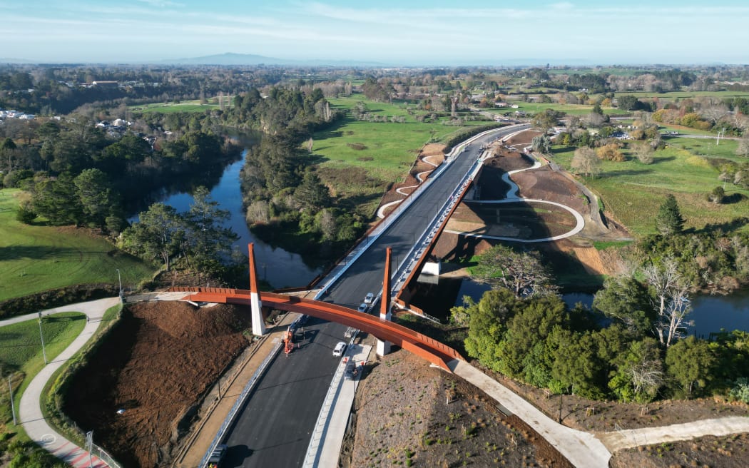 Drone footage gives a Birdseye view of the new bridge linking Peacocke subdivision with the southern edge of Hamilton.