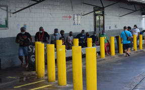 StarKist cannery workers waiting outside the plant
