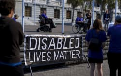 Disability campaigners presented a petition and a box full of stories asking the government to listen on 23 March, 2021.