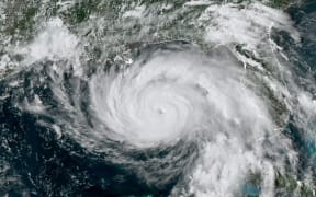 This National Oceanic and Atmospheric Administration satellite handout image shows Hurricane Ida approaching Louisiana.
