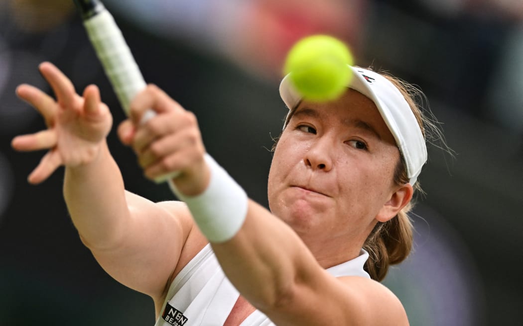 New Zealand's Lulu Sun returns the ball to Croatia's Donna Vekic during their women's singles quarter-finals tennis match on the ninth day of the 2024 Wimbledon Championships at The All England Lawn Tennis and Croquet Club in Wimbledon, southwest London, on July 9, 2024.