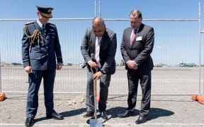 Defence Minister Peeni Henare turns a sod at the site of the Manawatū facility, which will house the four P-8A Posiden aircraft.