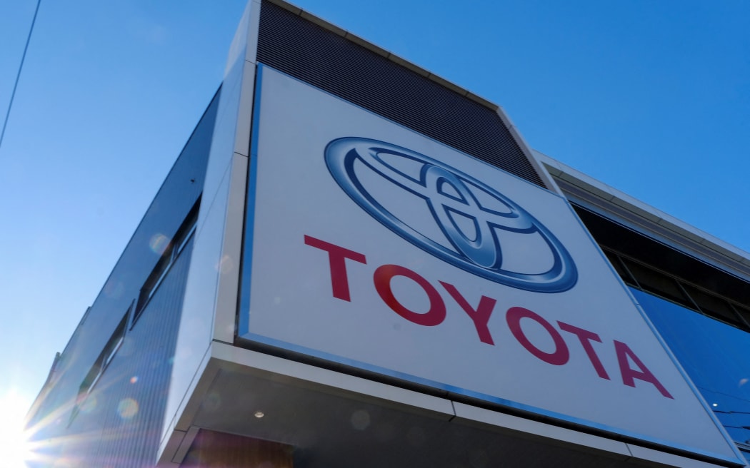 The logo of Japan's Toyota Motor is displayed at a dealership in Tokyo on 9 February, 2022.