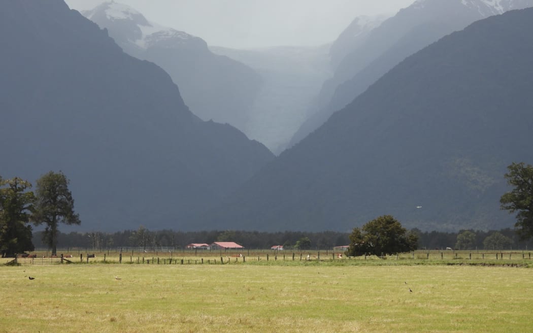 The iconic Fox Glacier viewed from the new Tohu Whenua site, Te Kopikopiko o Te Waka, on Cook Flat. The new glacier viewing site celebrates the area's significant cultural heritage and was developed as a result of the permanent closure of the DOC administered road into the glacier in 2017.