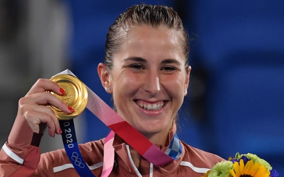 Gold medallist Switzerland's Belinda Bencic poses with her medal during the Tokyo 2020 Olympic Games women's singles tennis medal ceremony at the Ariake Tennis Park in Tokyo on July 31, 2021.