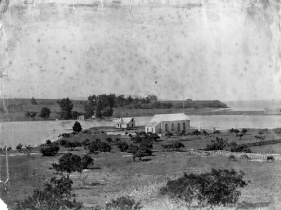 A photograph of the marae at Te Tii, on the banks of the Waitangi River in 1880.