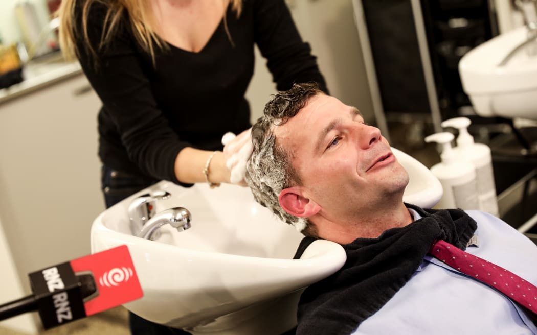 Seymour getting a haircut at Rodney Wayne in New Market, Auckland.