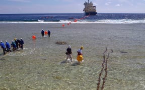 A cable bringing broadband to Hao atoll in French Polynesia is landed in August 2018