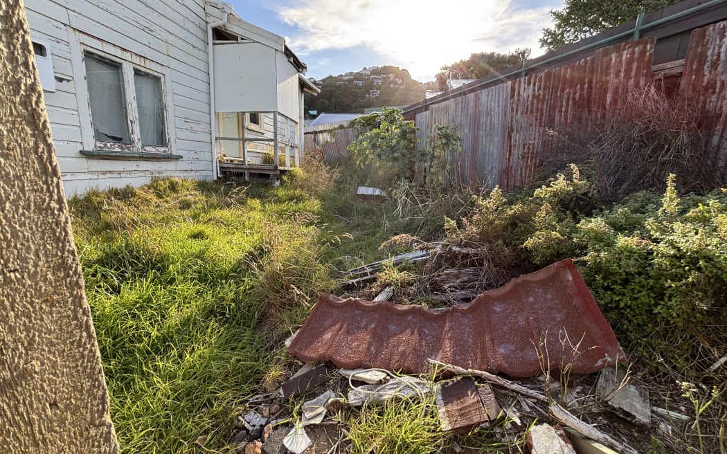 Emma Dee says the sight of the recent damage to the Queens Drive building made her “hands shake” after her own home was struck by airborne roofing iron during recent storms.