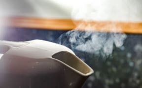 A jug boiling water.