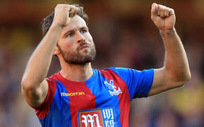 Yohan Cabaye of Crystal Palace celebrates scoring a winning goal.