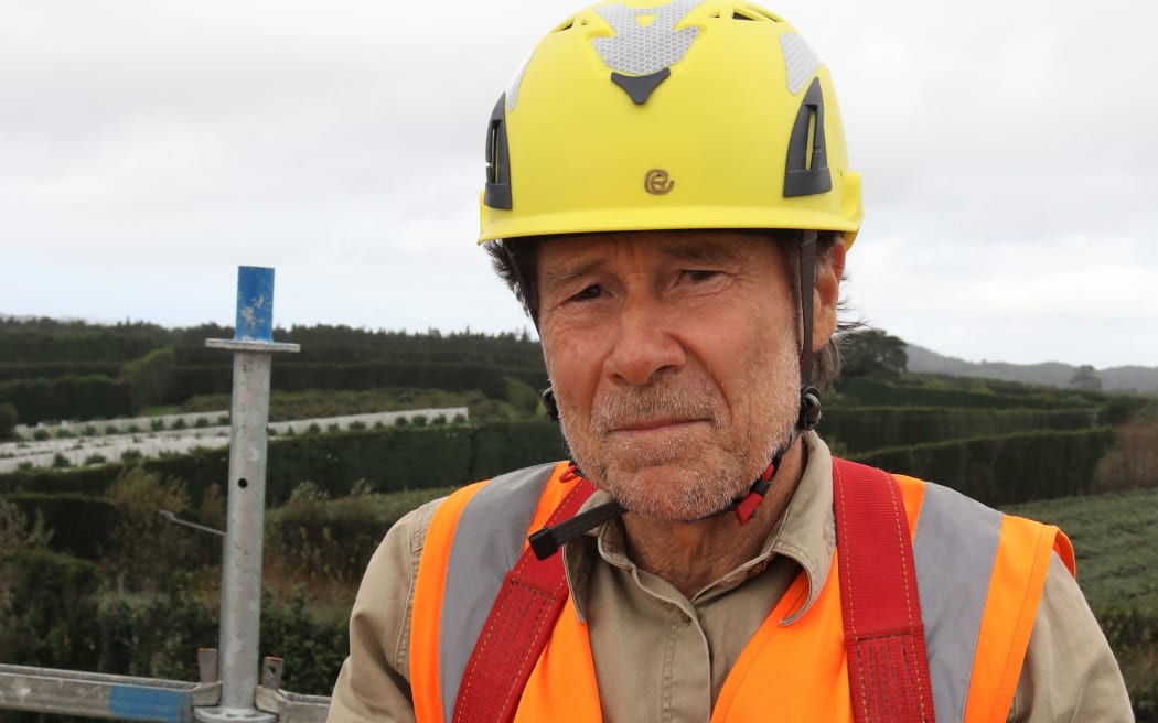 A despondent Chris Booth at the top Te Haa o Te Ao (The Breath of the World) in May 2022 after the vandalised sculpture had to be partly deconstructed.