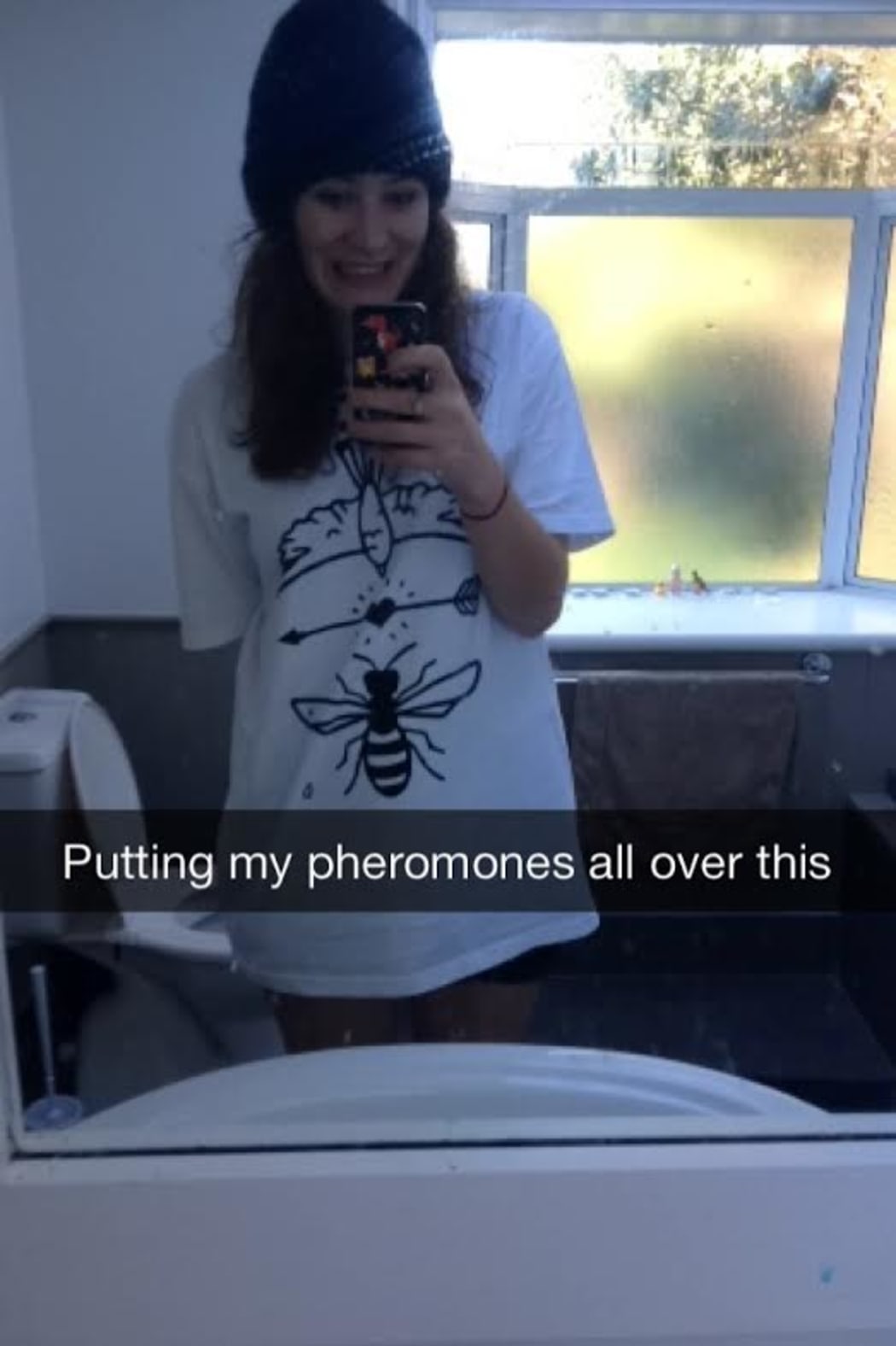 A Snapchat screenshot of Julia wearing a T-shirt