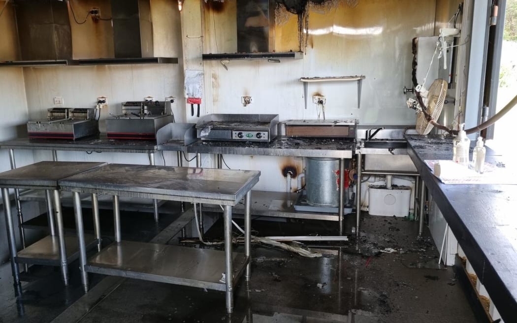 Police said emergency services were called to the blaze at Waitākere BMX club on Glen Road in Rānui just before 2pm on Monday. The club has posted photos of the canteen on Facebook, which show the standalone container-like structure blackened inside and out.