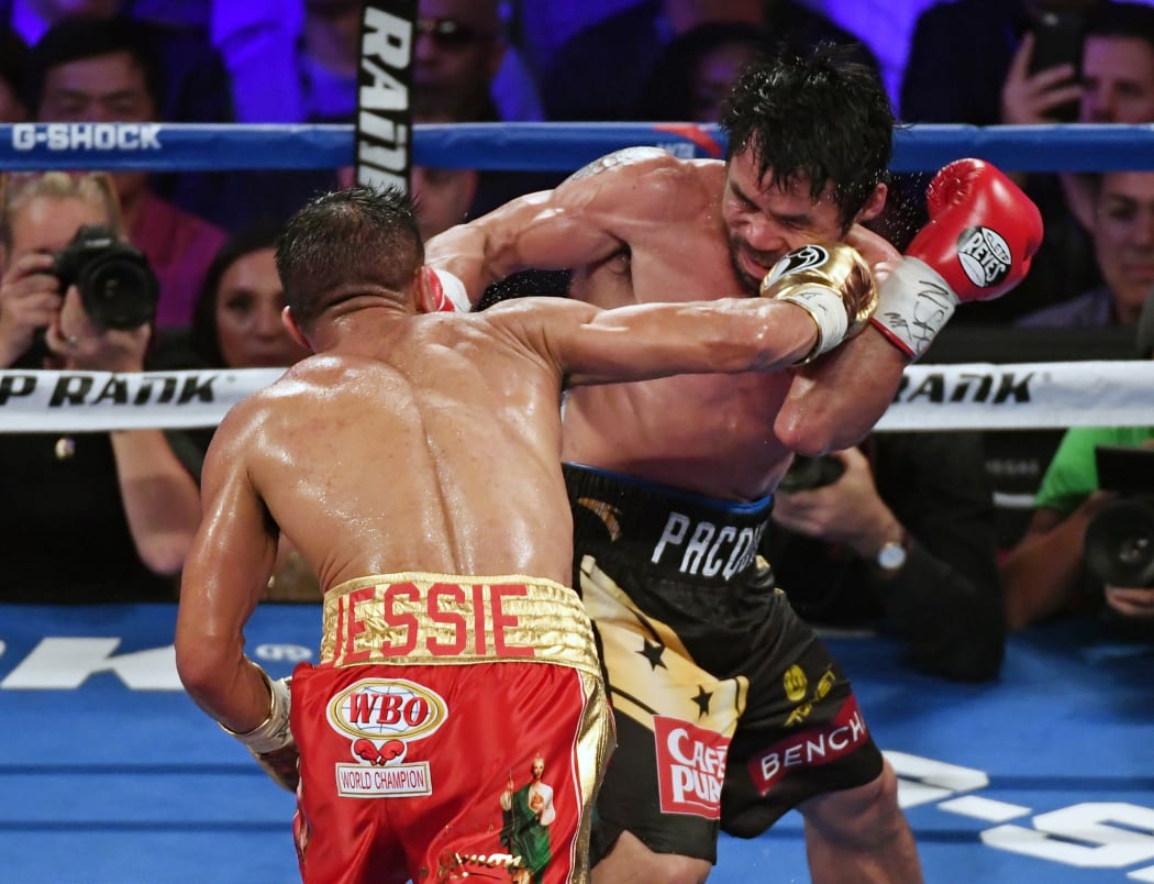 Manny Pacquiao beat Jessie Vrgas to win WBO welterweight title after brief retirement