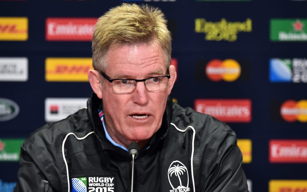 Fiji's head coach John McKee attends a press conference in Cardiff.