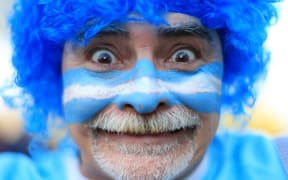 An Argentina fan watches his team's win over Namibia at the 2015 Rugby World Cup.